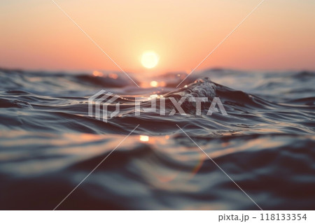 Close up of ocean wave at sunset with colorful sky 118133354