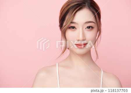 Beautiful young asian woman with clean fresh skin on pink background, Face care, Facial treatment, Cosmetology, beauty and spa, Asian women portrait. 118137703
