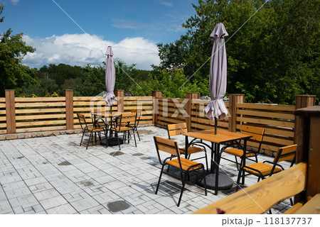 Summer open-air cafe without people Summer open-air cafe without people 118137737
