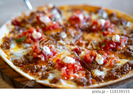 Nacho with minced meat and tomato salsa sauce 118139155