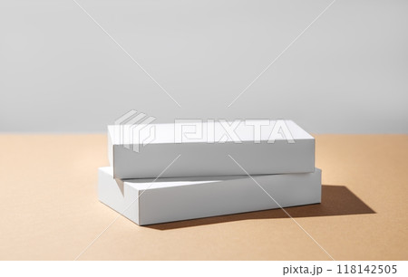 Empty podium for product. Minimal two white boxes on a beige background with hard shadow. 118142505