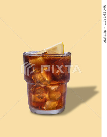 Iced tea, Cuba Libre or Long Island cocktail with cola, lemon and ice in a glass Iced tea, Cuba Libre or Long Island cocktail with cola, lemon and ice in a glass 118143046