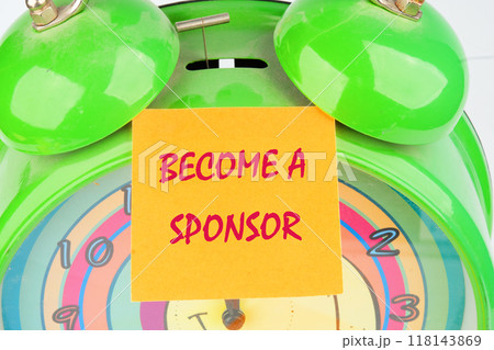 Business and Become a sponsor concept. Copy space. Concept word BECOME A SPONSOR on the sticker on the background of the alarm clock Business and Become a sponsor concept. Copy space. Concept word BECOME A SPONSOR on the sticker on the background of the alarm clock 118143869