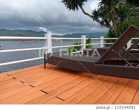 wood terrace on the beach 118144091