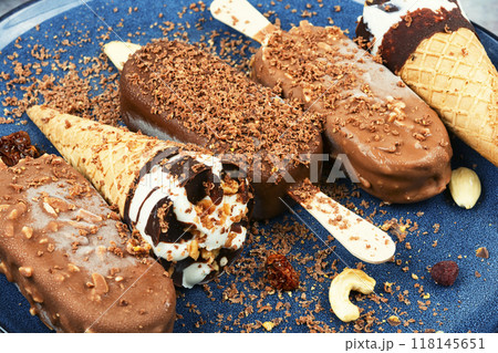 Vanilla ice cream with chocolate. Vanilla ice cream with chocolate. 118145651