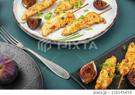 Grilled chicken on bamboo skewers. Grilled chicken on bamboo skewers. 118145659