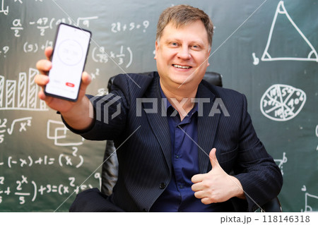 The teacher started a countdown on the phone during the exam for completing the task The teacher started a countdown on the phone during the exam for completing the task 118146318