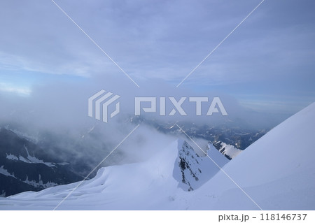 Tranquil Lake With Lush Green Forest, Snow-Capped Mountain, Blue Sky And White Clouds Tranquil Lake With Lush Green Forest, Snow-Capped Mountain, Blue Sky And White Clouds 118146737