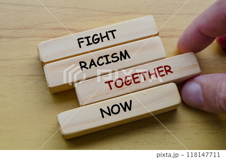 Fight Racism Together Now text on wooden blocks. Against discrimination, racism and harassment concept Fight Racism Together Now text on wooden blocks. Against discrimination, racism and harassment concept 118147711