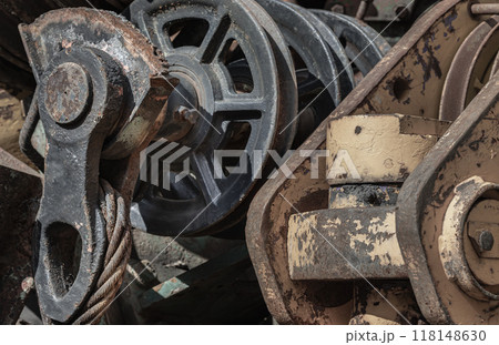 Old tractor parts, Rusty ndustrial machinery and other used at second hand parts car shop. 118148630