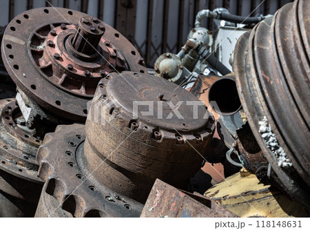 Old tractor parts, Rusty ndustrial machinery and other used at second hand parts car shop. 118148631