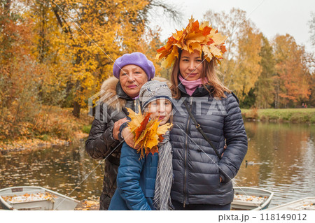 Autumn family outdoor. Grandmother, mother and daughter together 118149012