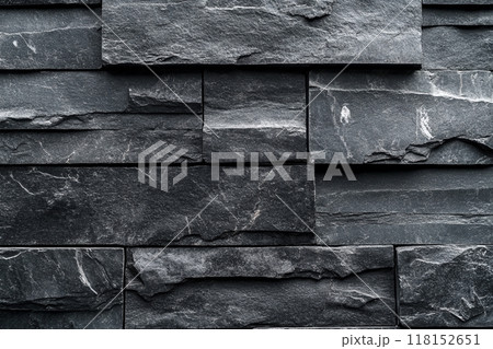 Dark gray slate wall cladding background, the texture of a natural stone panel for interior or exterior decoration. 118152651