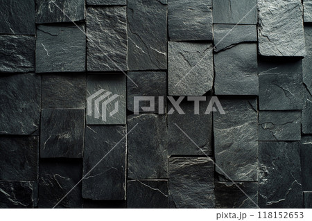 Dark gray slate wall cladding background, the texture of a natural stone panel for interior or exterior decoration. Dark gray slate wall cladding background, the texture of a natural stone panel for interior or exterior decoration. 118152653