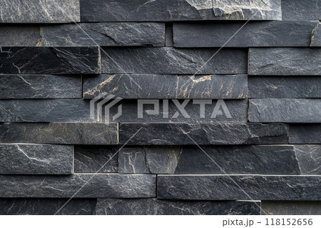 Dark gray slate wall cladding background, the texture of a natural stone panel for interior or exterior decoration. 118152656