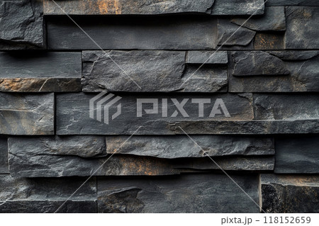 Dark gray slate wall cladding background, the texture of a natural stone panel for interior or exterior decoration. Dark gray slate wall cladding background, the texture of a natural stone panel for interior or exterior decoration. 118152659