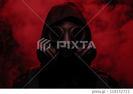 A person wearing a gas mask with a red light, in a horror-style setting with a dark background. A person wearing a gas mask with a red light, in a horror-style setting with a dark background. 118152721