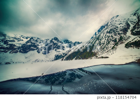 Frozen Lake Morskie Oko or Sea Eye Lake in Poland at Winter. Frozen Lake Morskie Oko or Sea Eye Lake in Poland at Winter. 118154704