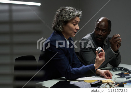 Discussing Business Plans in a Corporate Meeting Room 118157283