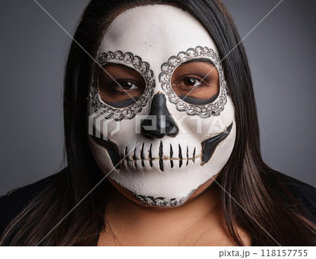 Woman in Skull and Bone Mask Day of the Dead Concept 118157755