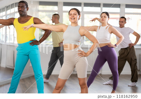 Young woman practicing active dance in training hall Young woman practicing active dance in training hall 118162950