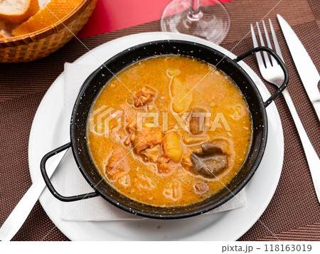 Portion of veal fillet with mushrooms cooked in large amount of fragrant gravy. 118163019