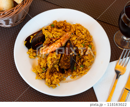 Popular dish of Spanish cuisine paella with seafood 118163022