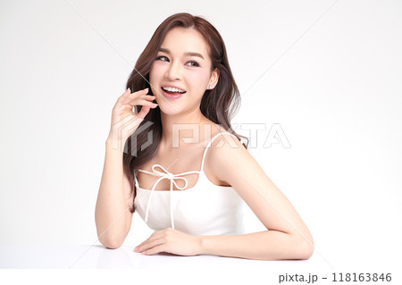 Beautiful young asian woman with clean fresh skin on white background, Face care, Facial treatment, Cosmetology, beauty and spa, Asian women portrait. Beautiful young asian woman with clean fresh skin on white background, Face care, Facial treatment, Cosmetology, beauty and spa, Asian women portrait. 118163846