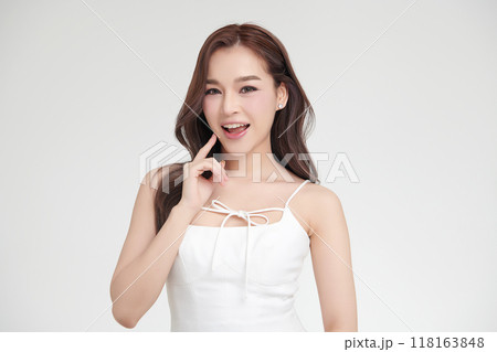 Beautiful young asian woman with clean fresh skin on white background, Face care, Facial treatment, Cosmetology, beauty and spa, Asian women portrait. Beautiful young asian woman with clean fresh skin on white background, Face care, Facial treatment, Cosmetology, beauty and spa, Asian women portrait. 118163848