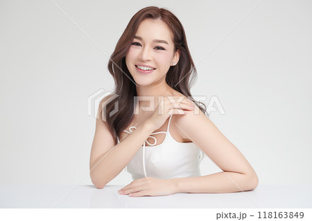 Beautiful young asian woman with clean fresh skin on white background, Face care, Facial treatment, Cosmetology, beauty and spa, Asian women portrait. Beautiful young asian woman with clean fresh skin on white background, Face care, Facial treatment, Cosmetology, beauty and spa, Asian women portrait. 118163849