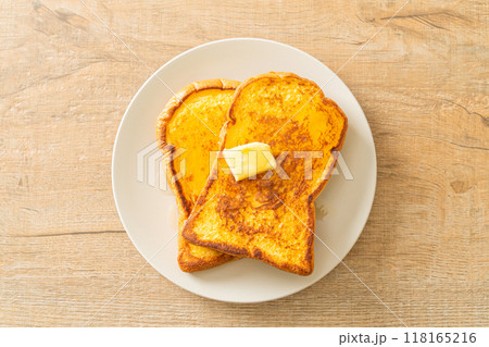 French toasted with butter and honey 118165216