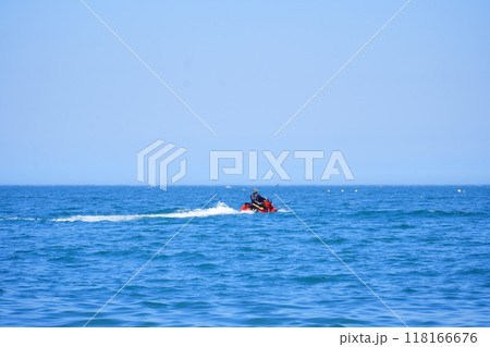 surfer on a motorboat on the sea surfer on a motorboat on the sea 118166676