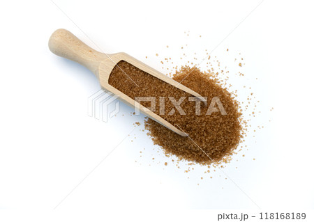 cane sugar in wooden scoop isolated on white background 118168189