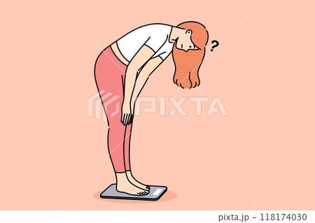 Sad woman checking own weight by stepping on scales and feeling embarrassed by increasing kilograms 118174030