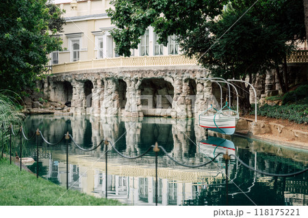 pond with a boat in the garden of Yildiz Palace in Istanbul pond with a boat in the garden of Yildiz Palace in Istanbul 118175221