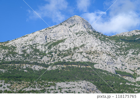 View of the Biokovo mountain range of the Dinaric Alps from Makarska riviera, Adriatic coast of Croatia 118175765