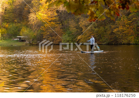 Paddleboarding in Autumn Serenity 118176250