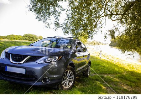 Gray SUV by the River in Nature 118176299