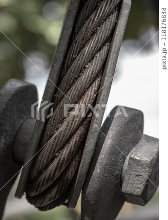 Close-up of Steel wire rope slings with Thimble and safety anchor shackle turnbuckle connection bolt for heavy work. 118176838