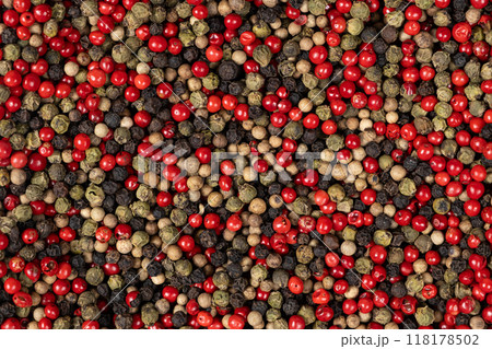 A mixture of different peppercorns white, black, red and green peppers spices. 118178502