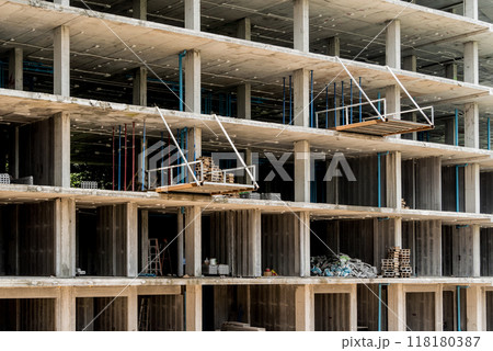 A new modern multi-storey residential building under construction A new modern multi-storey residential building under construction 118180387