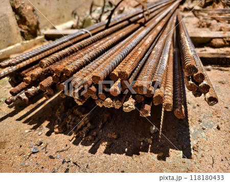Sturdy steel rebars at a construction site Sturdy steel rebars at a construction site 118180433