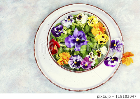 Vegetable salad with edible flowers. Vegetable salad with edible flowers. 118182047
