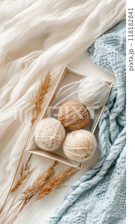 Neutral Yarn Balls with Pampas Grass on Fabric Neutral Yarn Balls with Pampas Grass on Fabric 118182841