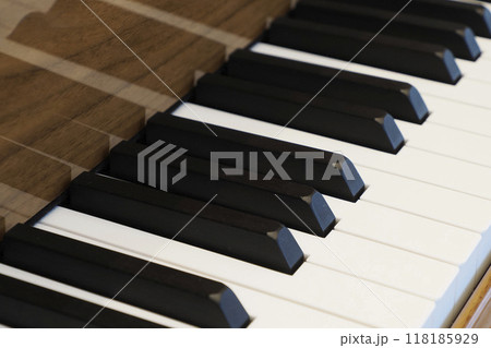 acoustic grand piano keyboard detail close up 118185929