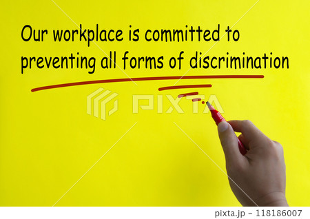 Our workplace is committed to preventing all forms of discrimination written on yellow cover. Safe workplace concept 118186007