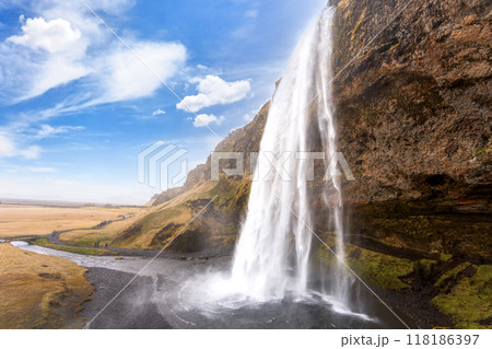 Seljalandsfoss: The Unique Walk-Behind Waterfall in Iceland. Seljalandsfoss: The Unique Walk-Behind Waterfall in Iceland. 118186397