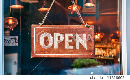 Open sign hanging in front door on restaurant or coffee at entrance. 118186624
