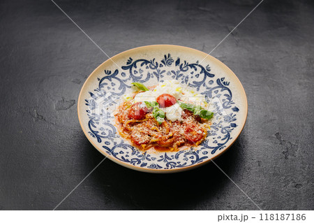 Italian pasta with cherry tomatoes, burrata, and fresh basil - gourmet dish for food lovers 118187186