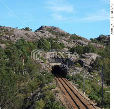 Fun park like rock landscape and railway tunnel in Hellvik, Norway. 118187747